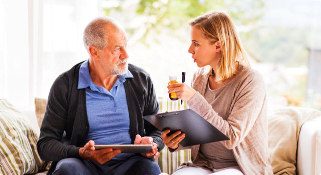 senior man talking with her daughter